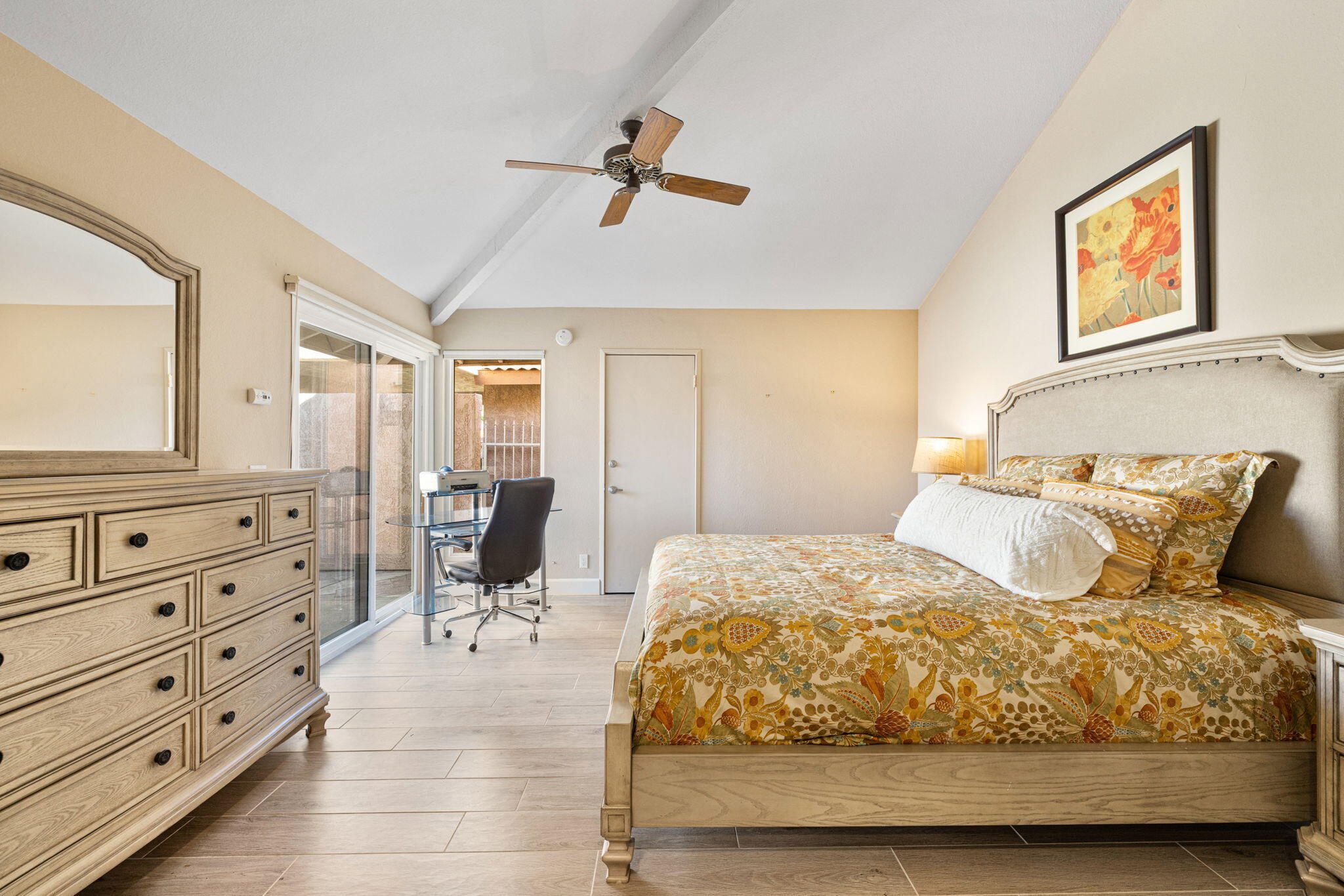 49091 Taylor Street Indio, CA 92201 - Photo 25 of 49 a bedroom with a bed and wooden floor