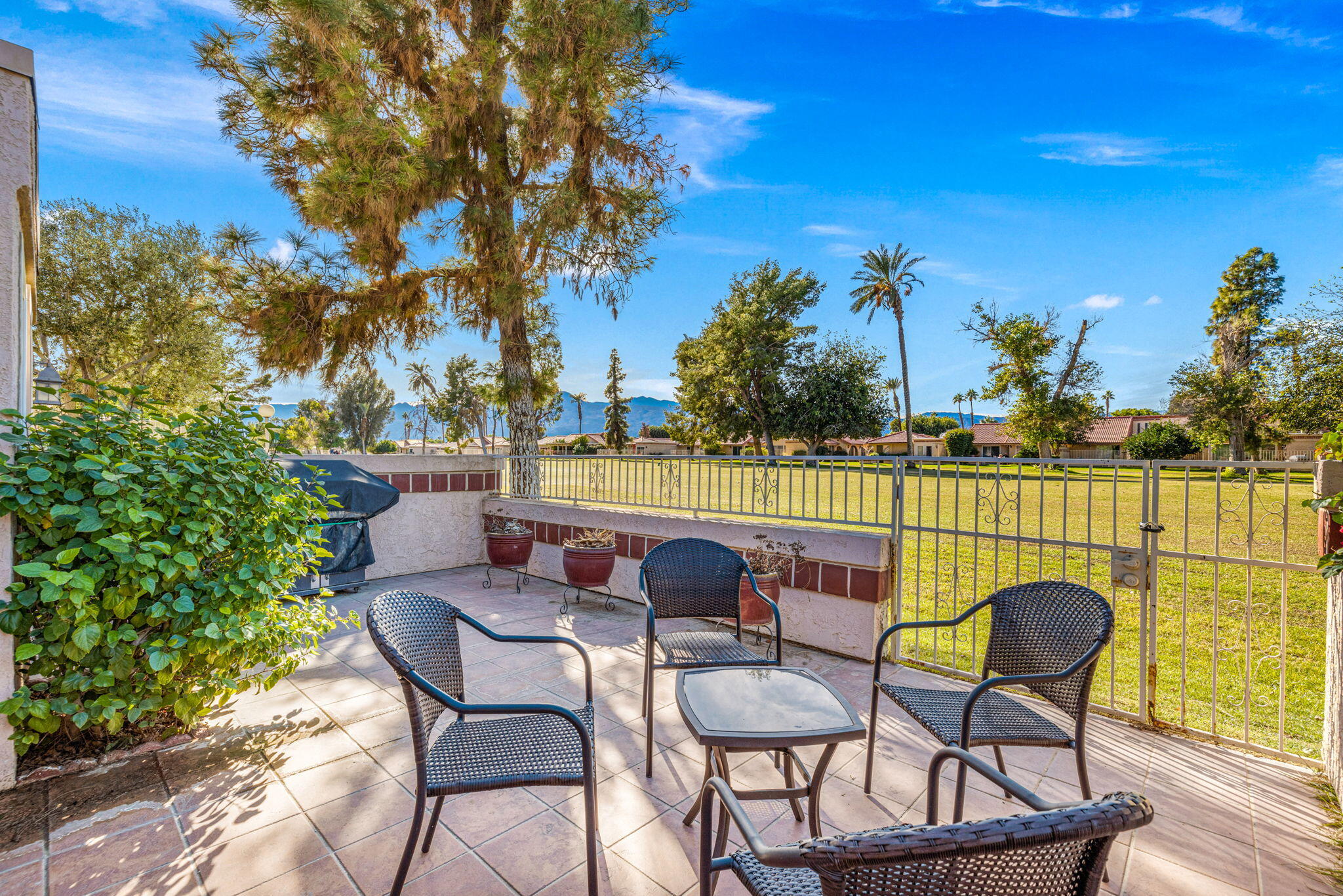 49091 Taylor Street Indio, CA 92201 - Photo 34 of 49 a view of a chairs and table in patio