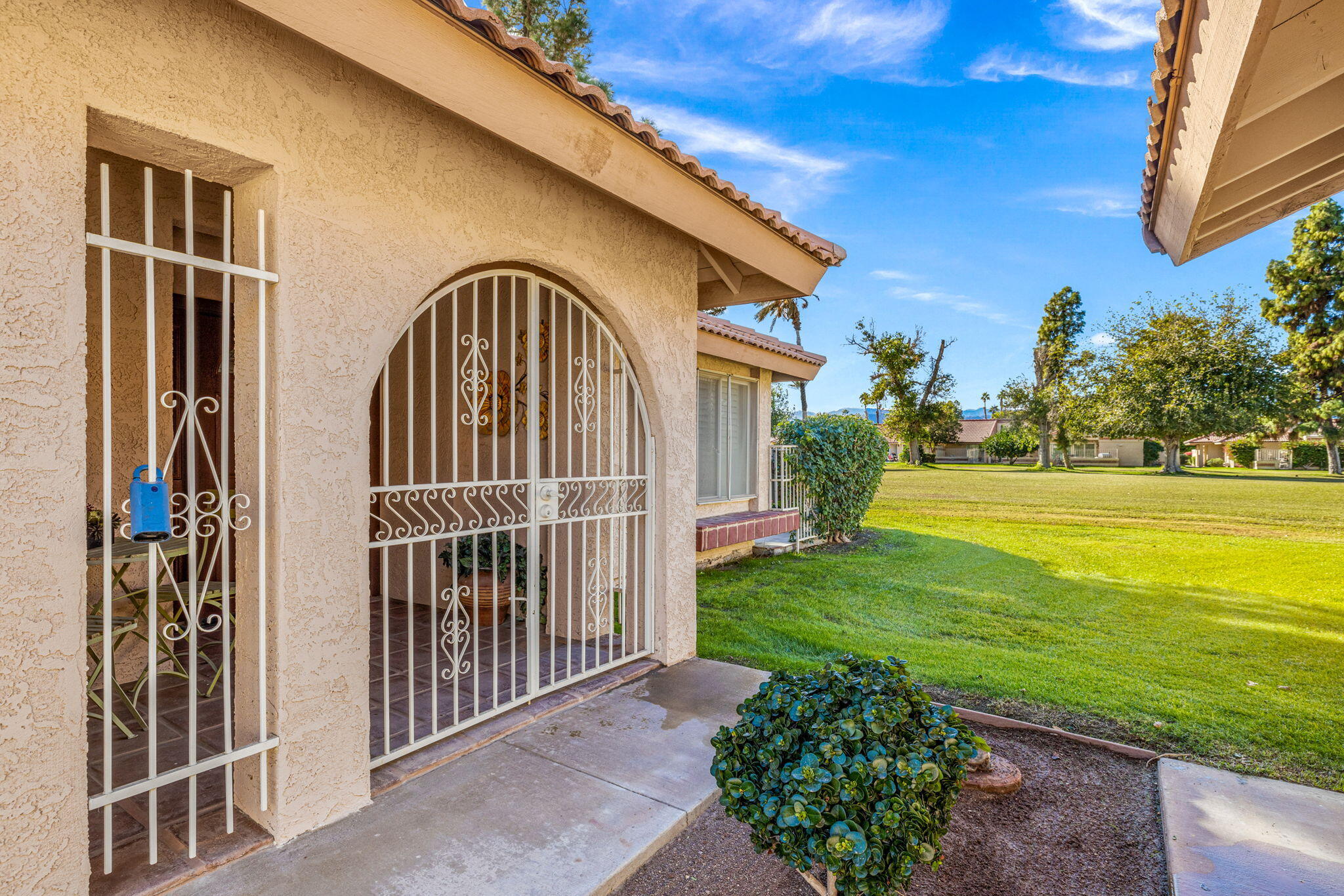 49091 Taylor Street Indio, CA 92201 - Photo 40 of 49 a front view of a house with garden