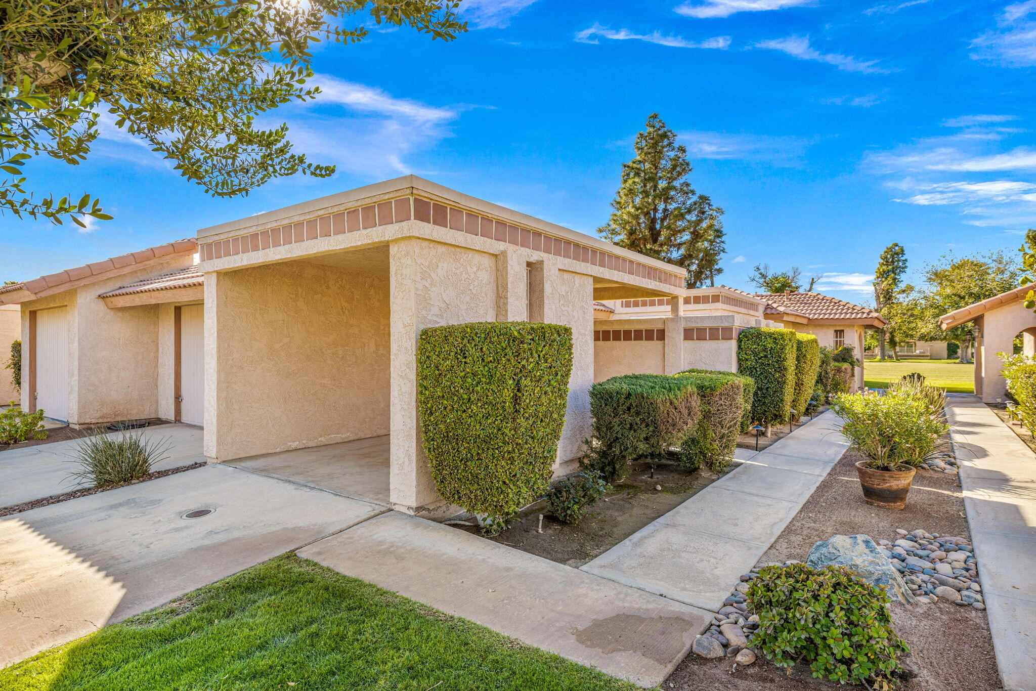 49091 Taylor Street Indio, CA 92201 - Photo 43 of 49 a front view of a house with garden