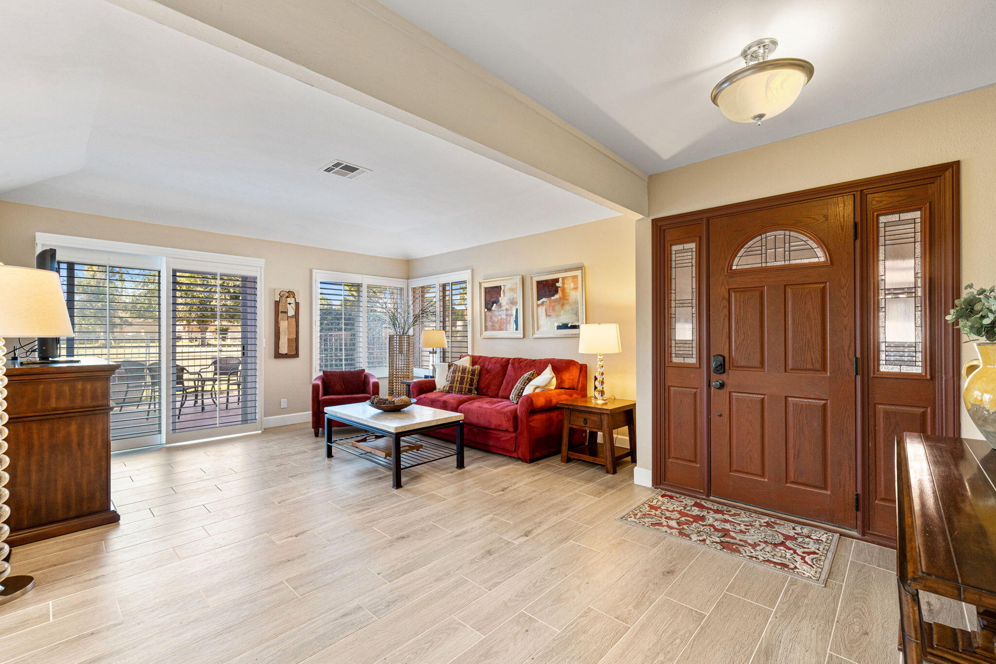 49091 Taylor Street Indio, CA 92201 - Photo 6 of 49 a living room with furniture and wooden floor