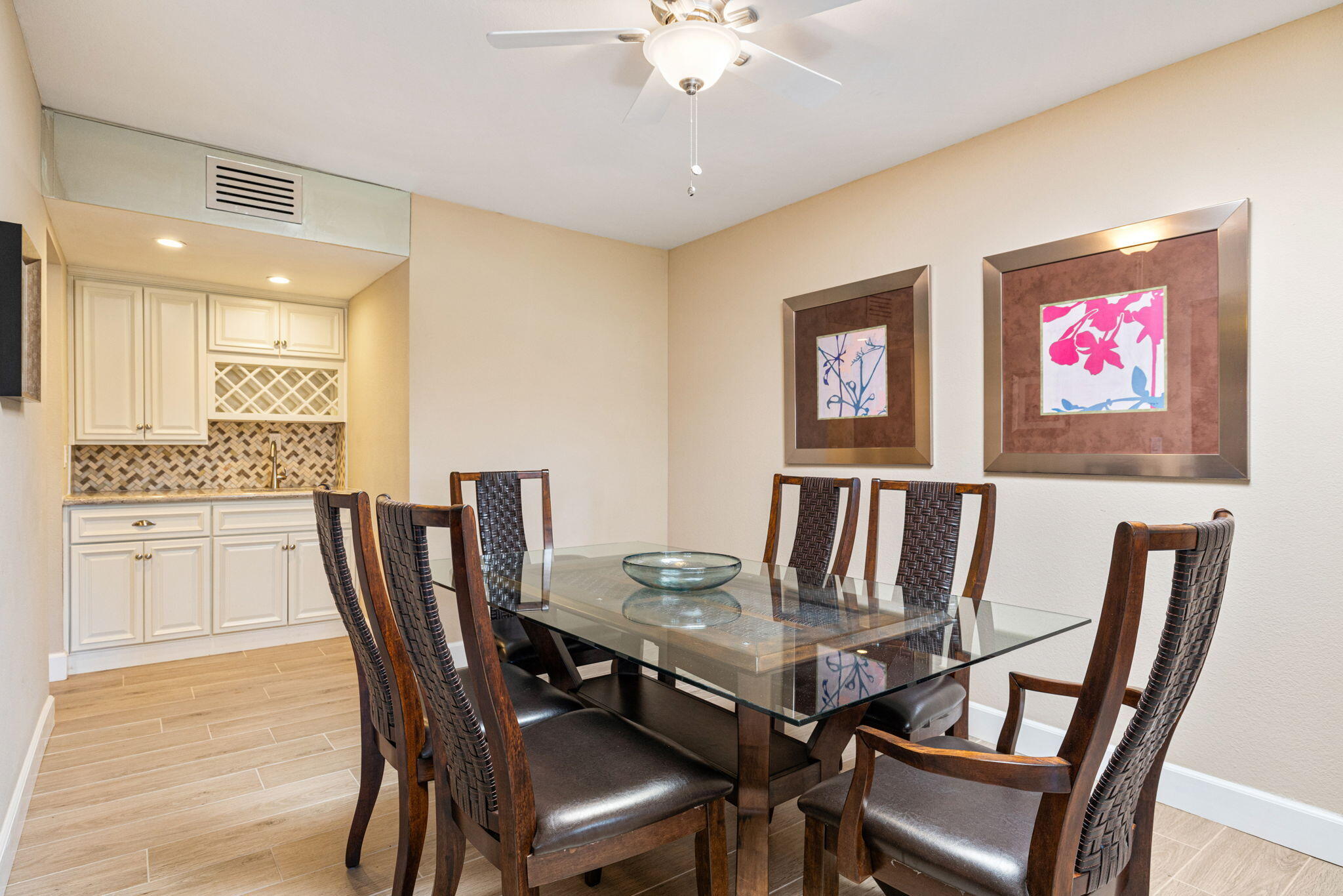 49091 Taylor Street Indio, CA 92201 - Photo 9 of 49 a view of a dining room with furniture and wooden floor
