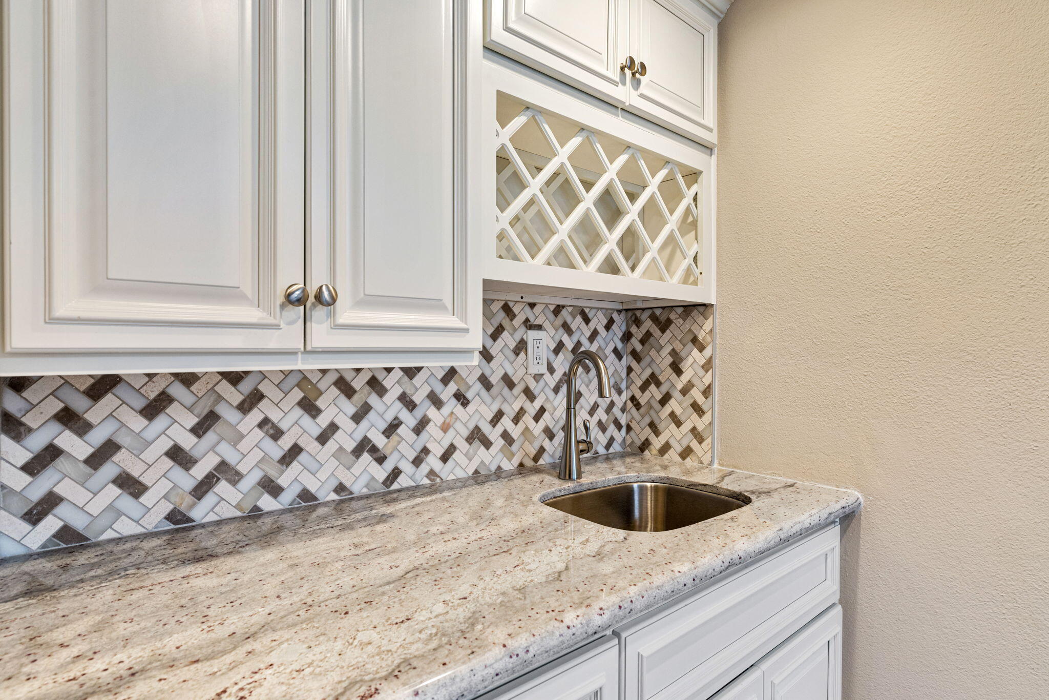 49091 Taylor Street Indio, CA 92201 - Photo 10 of 49 a kitchen with granite countertop a sink and a stove