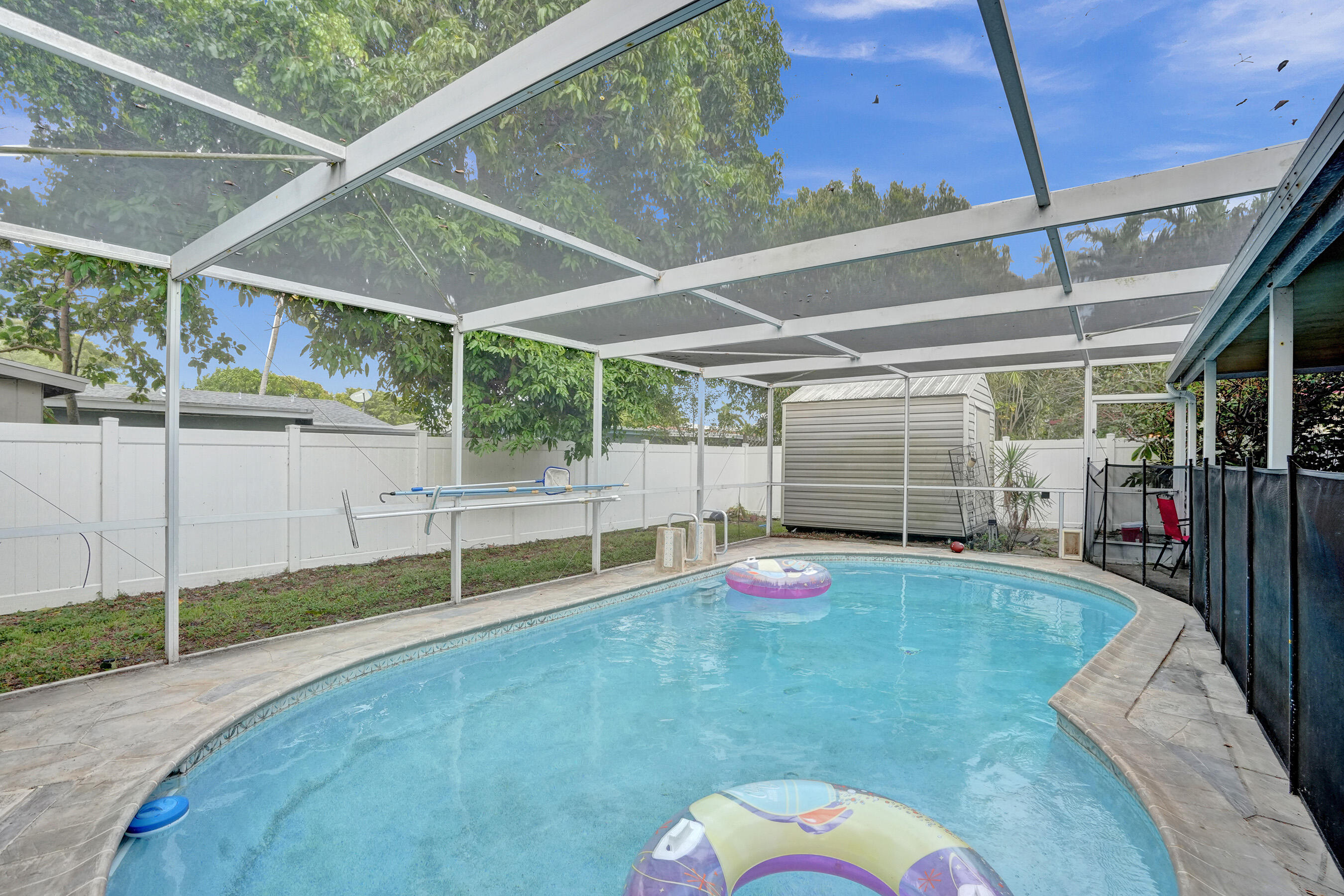 7697 Forest Boulevard North Lauderdale, FL 33068 - Photo 18 of 30 a view of a backyard