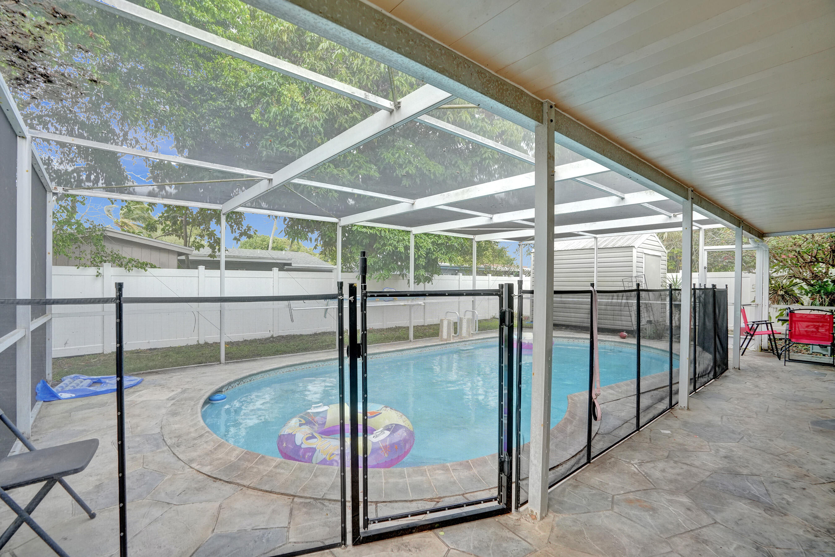 7697 Forest Boulevard North Lauderdale, FL 33068 - Photo 21 of 30 a glass door with glass top of glass door
