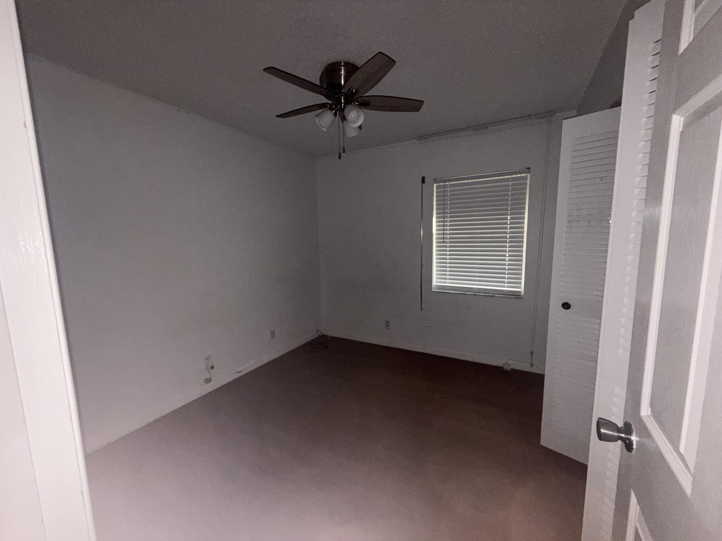 7697 Forest Boulevard North Lauderdale, FL 33068 - Photo 24 of 30 a view of a livingroom with a ceiling fan and window