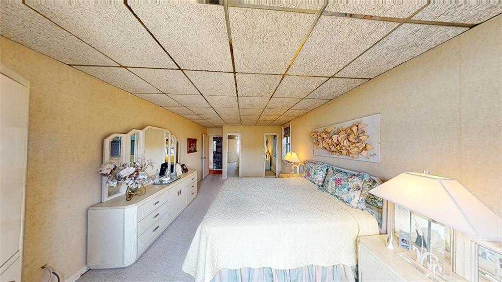 2373 Ocean Parkway, Unit 2J Brooklyn, NY 11223 - Photo 17 of 24 a bedroom with furniture and a large window