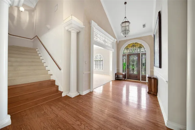 a view of entryway with wooden floor