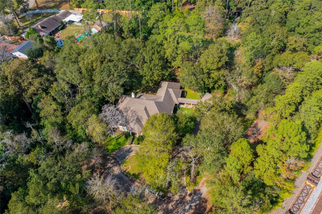 a view of a house with a tree