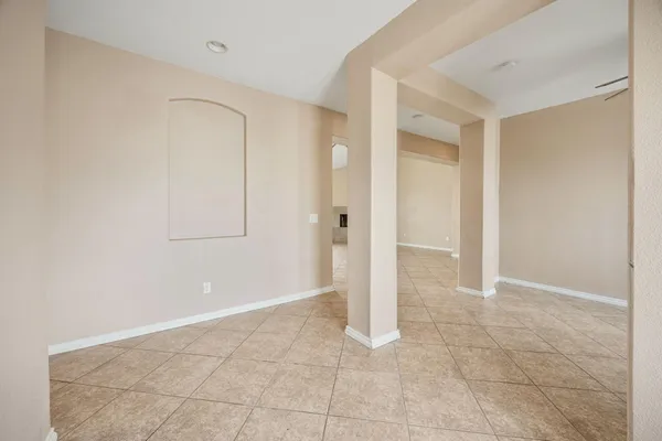 wooden floor in a room with a bathroom