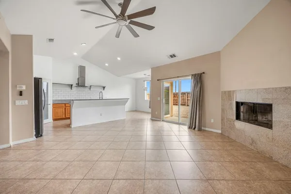 a view of a hallway with a kitchen