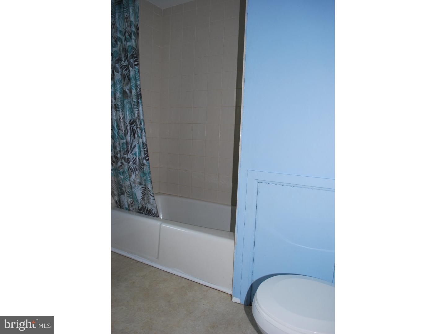 643 Blake Road Elkton, MD 21921 - Photo 15 of 15 a open kitchen with a sink and cabinet