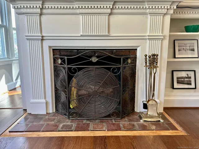 a view of fireplace and livingroom