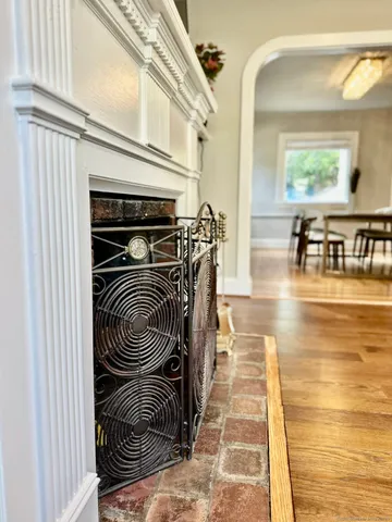 a close view of walk in closet with open kitchen view
