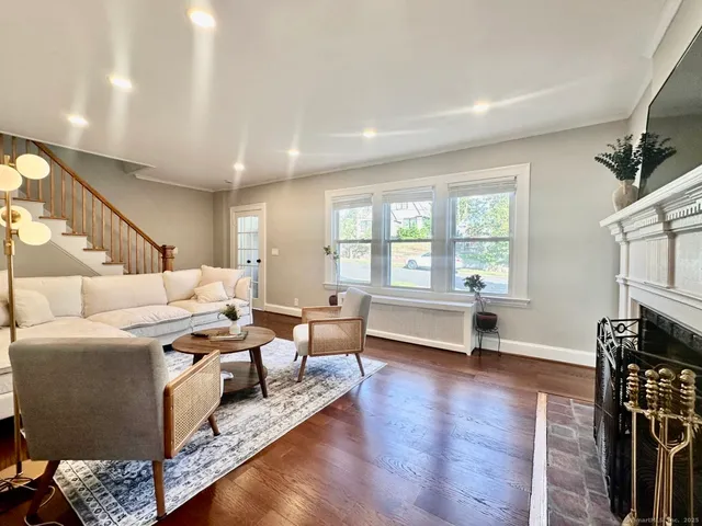 a living room with furniture and a window