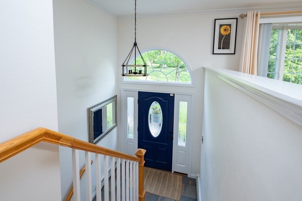 21 Harvest Lane Hingham, MA 02043 - Photo 22 of 35 a front view of a house with entryway