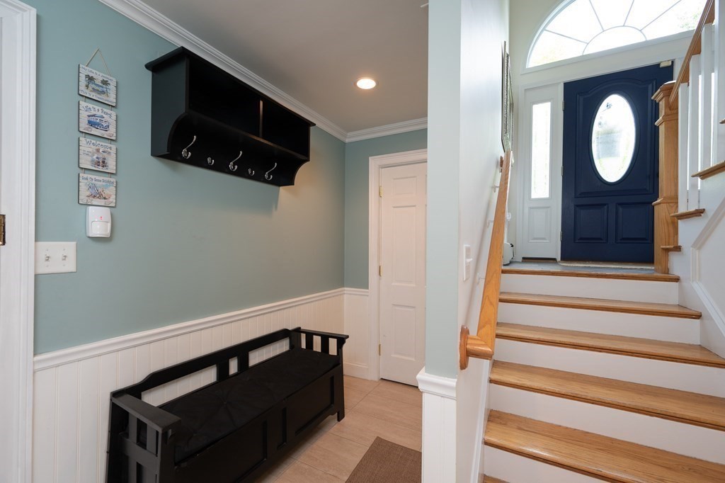 21 Harvest Lane Hingham, MA 02043 - Photo 23 of 35 a view of entryway and hall with wooden floor