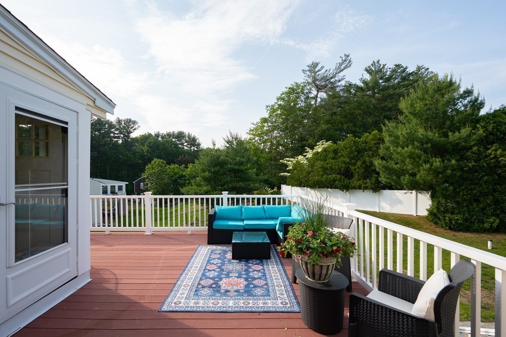 21 Harvest Lane Hingham, MA 02043 - Photo 27 of 35 a view of a chair and tables