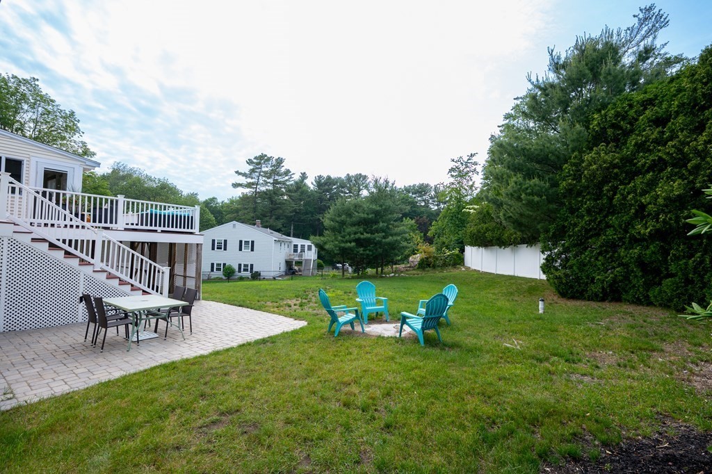 21 Harvest Lane Hingham, MA 02043 - Photo 30 of 35 a view of a house with a yard porch and sitting area