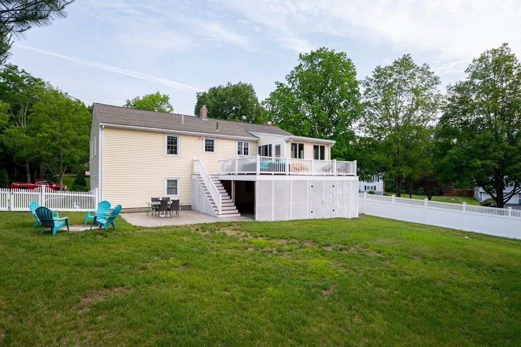 21 Harvest Lane Hingham, MA 02043 - Photo 31 of 35 a view of a house with patio and a yard