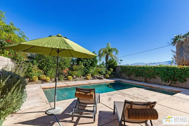 a view of yard with patio