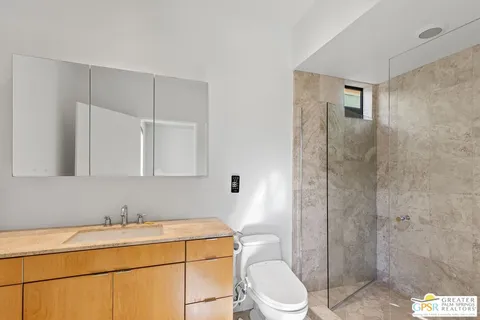 a view of an entryway with a ceiling fan