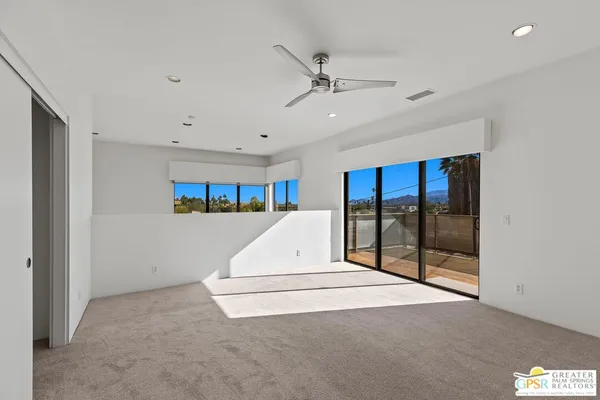 a view of a room with balcony