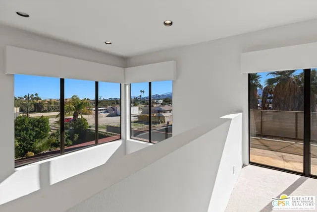 a view of a kitchen with a sink