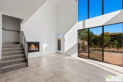 a view of a hallway with staircase