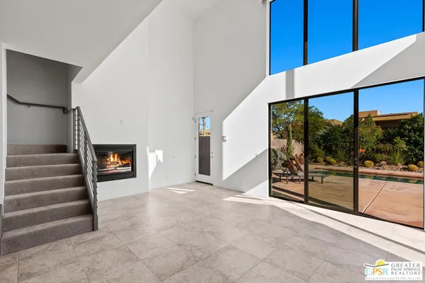 a view of a hallway with staircase