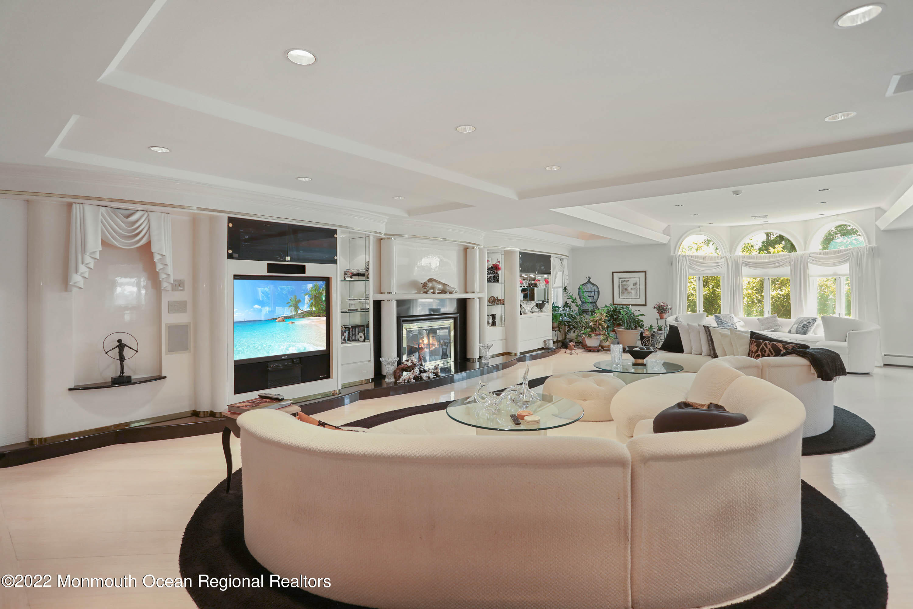 1903 Shadowbrook Drive Wall, NJ 07719 - Photo 18 of 74 a dining room with furniture a mirror and kitchen view