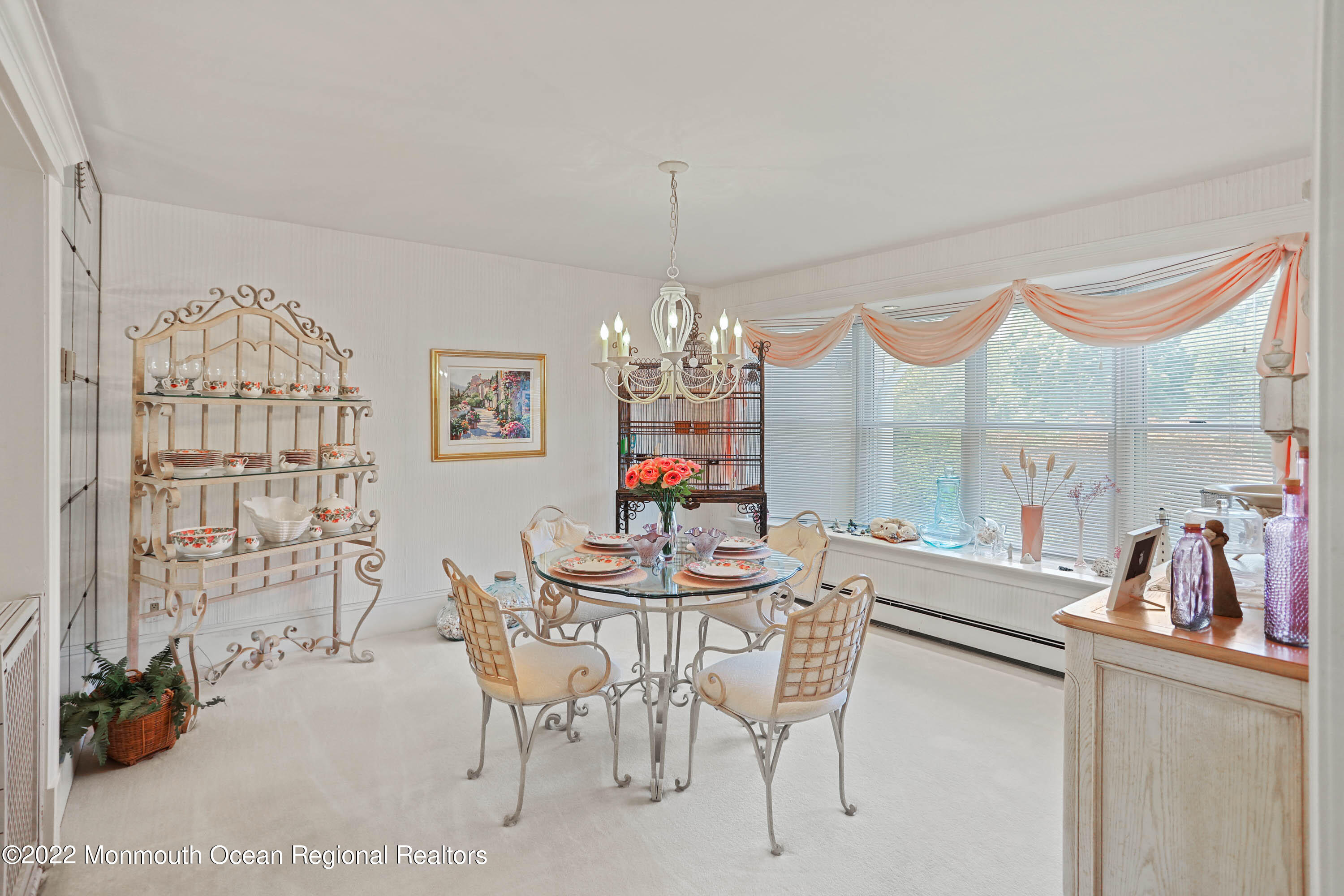 1903 Shadowbrook Drive Wall, NJ 07719 - Photo 28 of 74 a view of a dining room with furniture a chandelier and a window