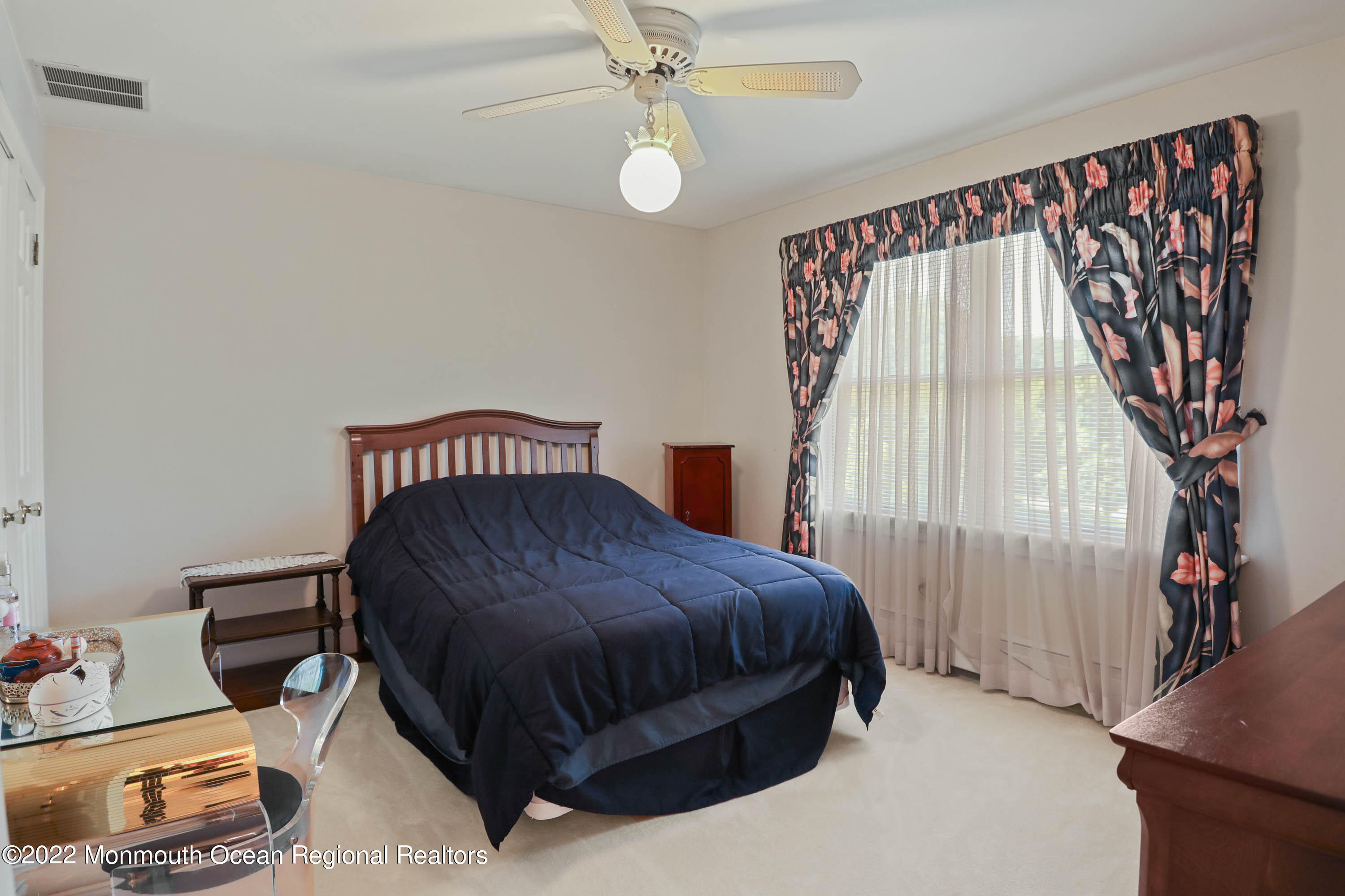 1903 Shadowbrook Drive Wall, NJ 07719 - Photo 45 of 74 a bedroom with a bed and a window