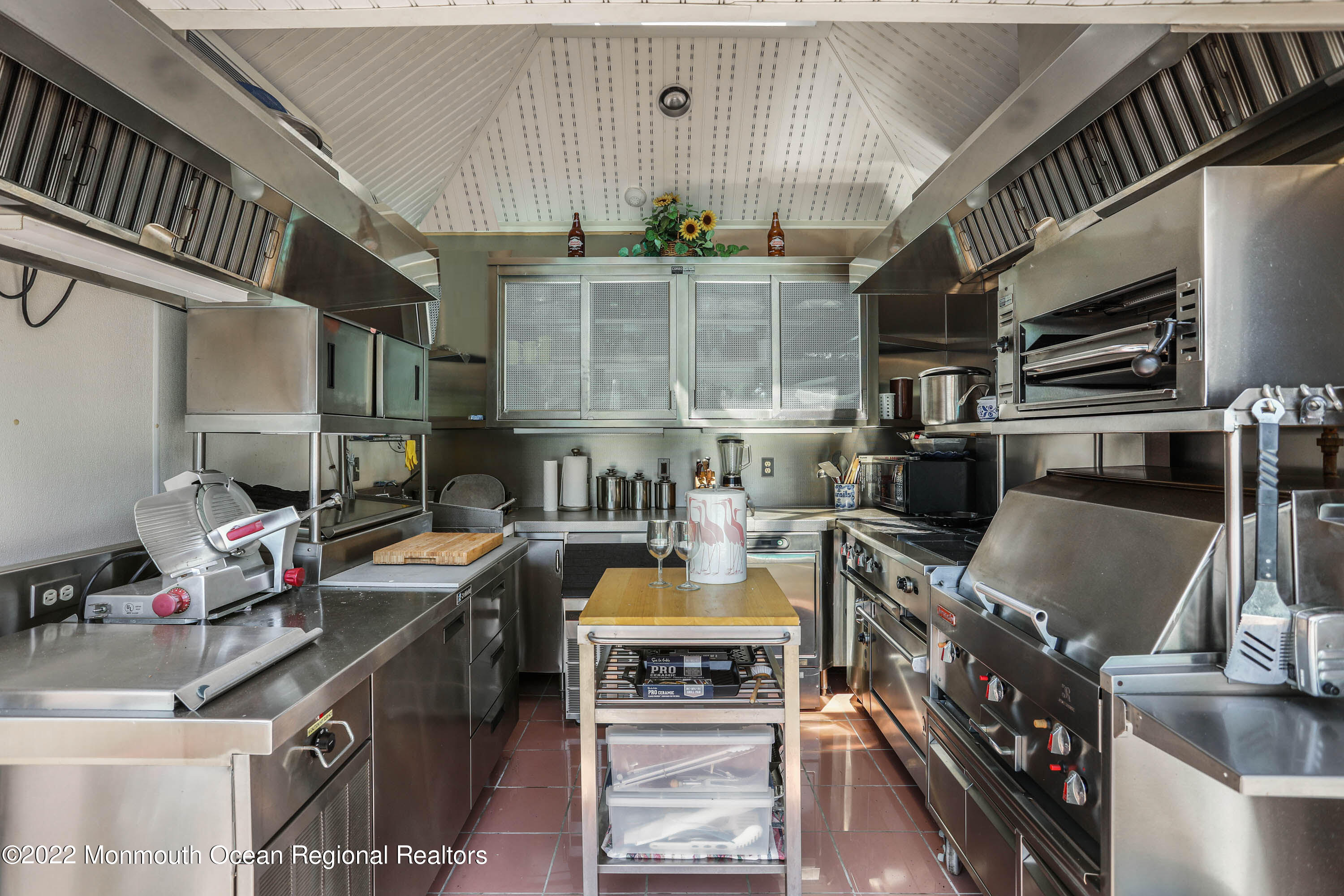 1903 Shadowbrook Drive Wall, NJ 07719 - Photo 49 of 74 a kitchen with stainless steel appliances a stove a sink dishwasher and cabinets
