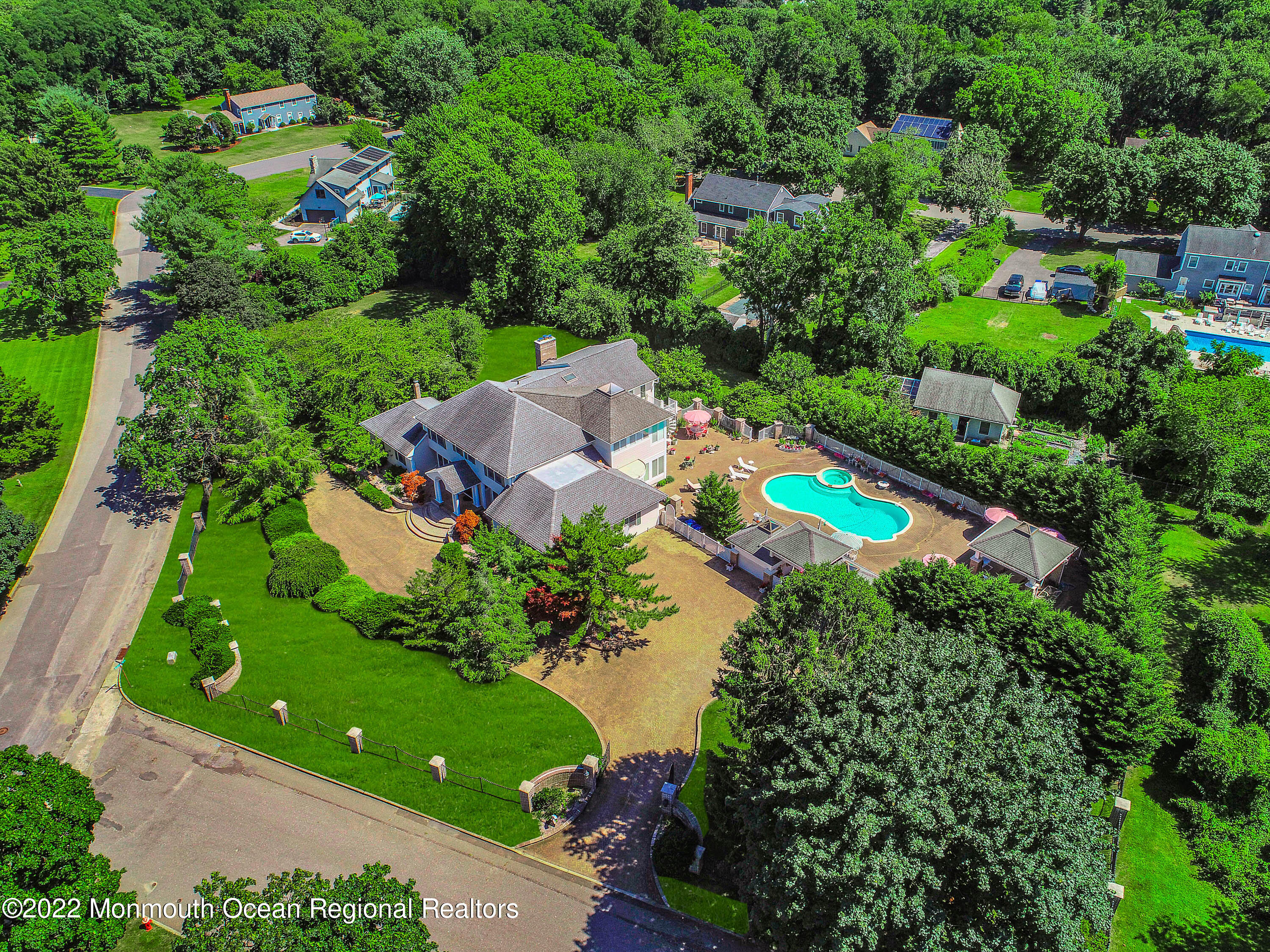 1903 Shadowbrook Drive Wall, NJ 07719 - Photo 51 of 74 an aerial view of a house with a garden