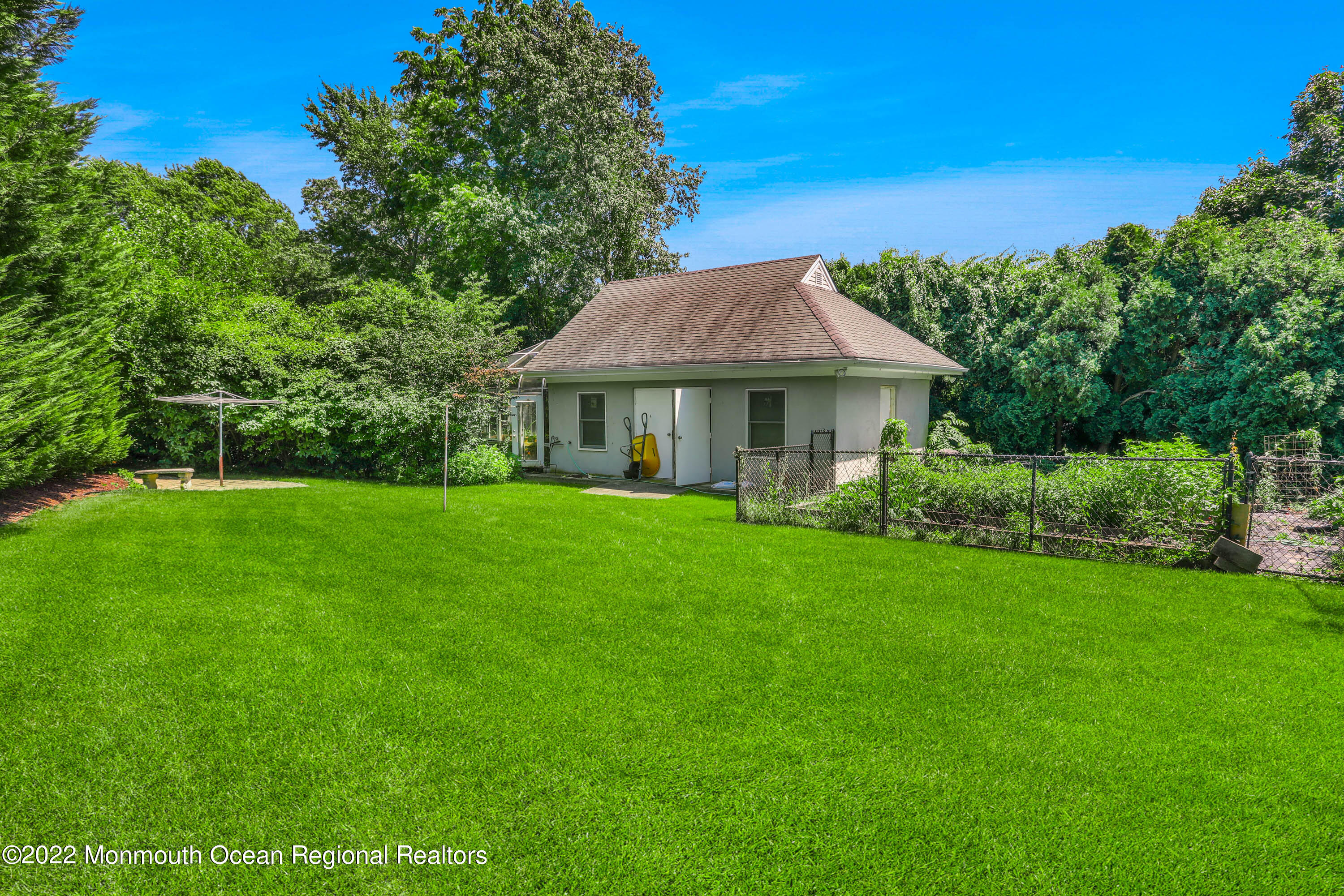 1903 Shadowbrook Drive Wall, NJ 07719 - Photo 54 of 74 a front view of a house with a yard
