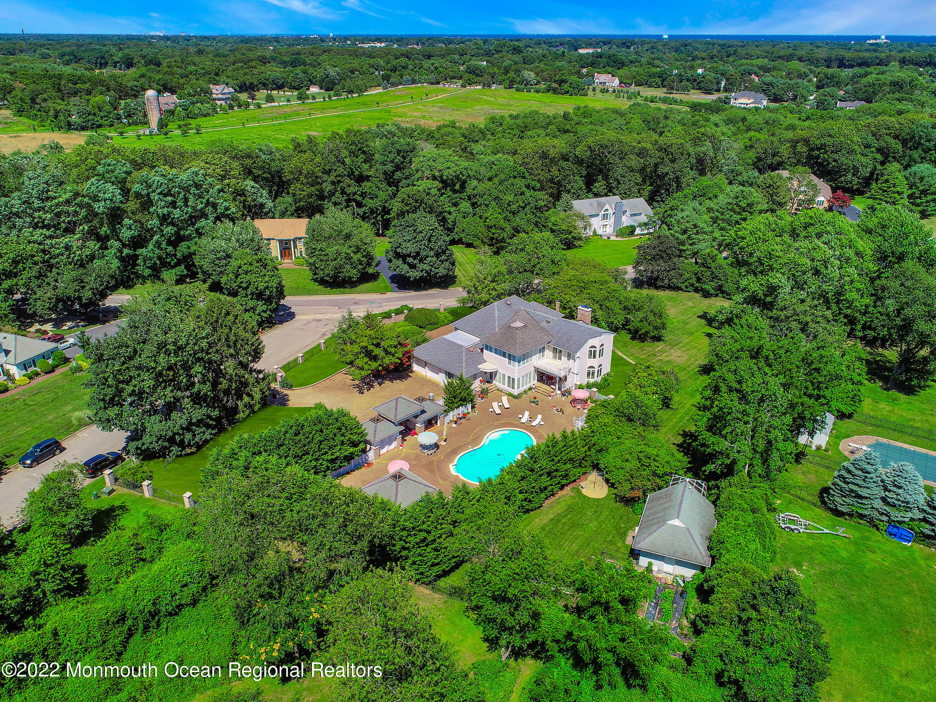 1903 Shadowbrook Drive Wall, NJ 07719 - Photo 64 of 74 an aerial view of a house with a yard