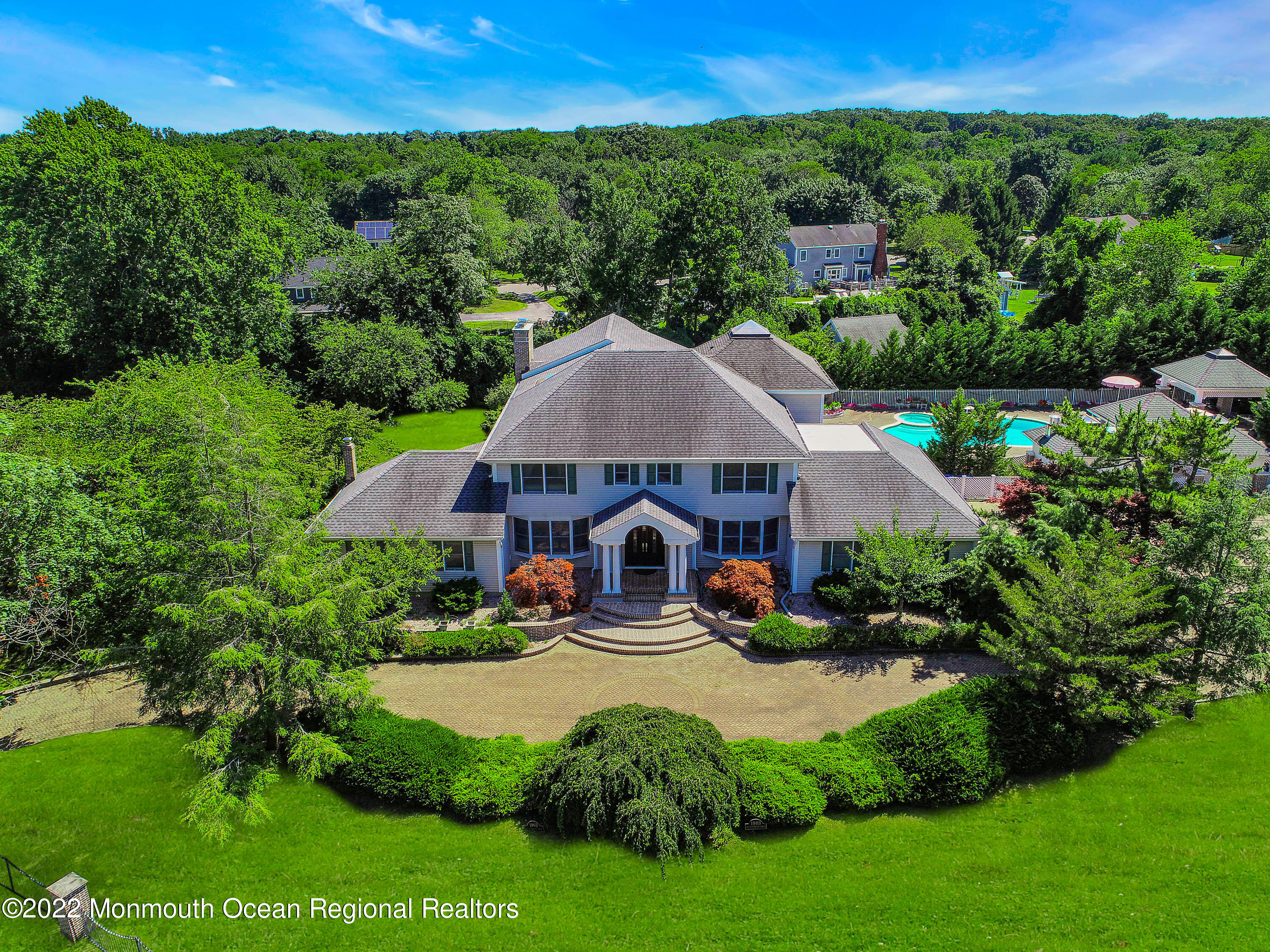 1903 Shadowbrook Drive Wall, NJ 07719 - Photo 65 of 74 a front view of a house with garden
