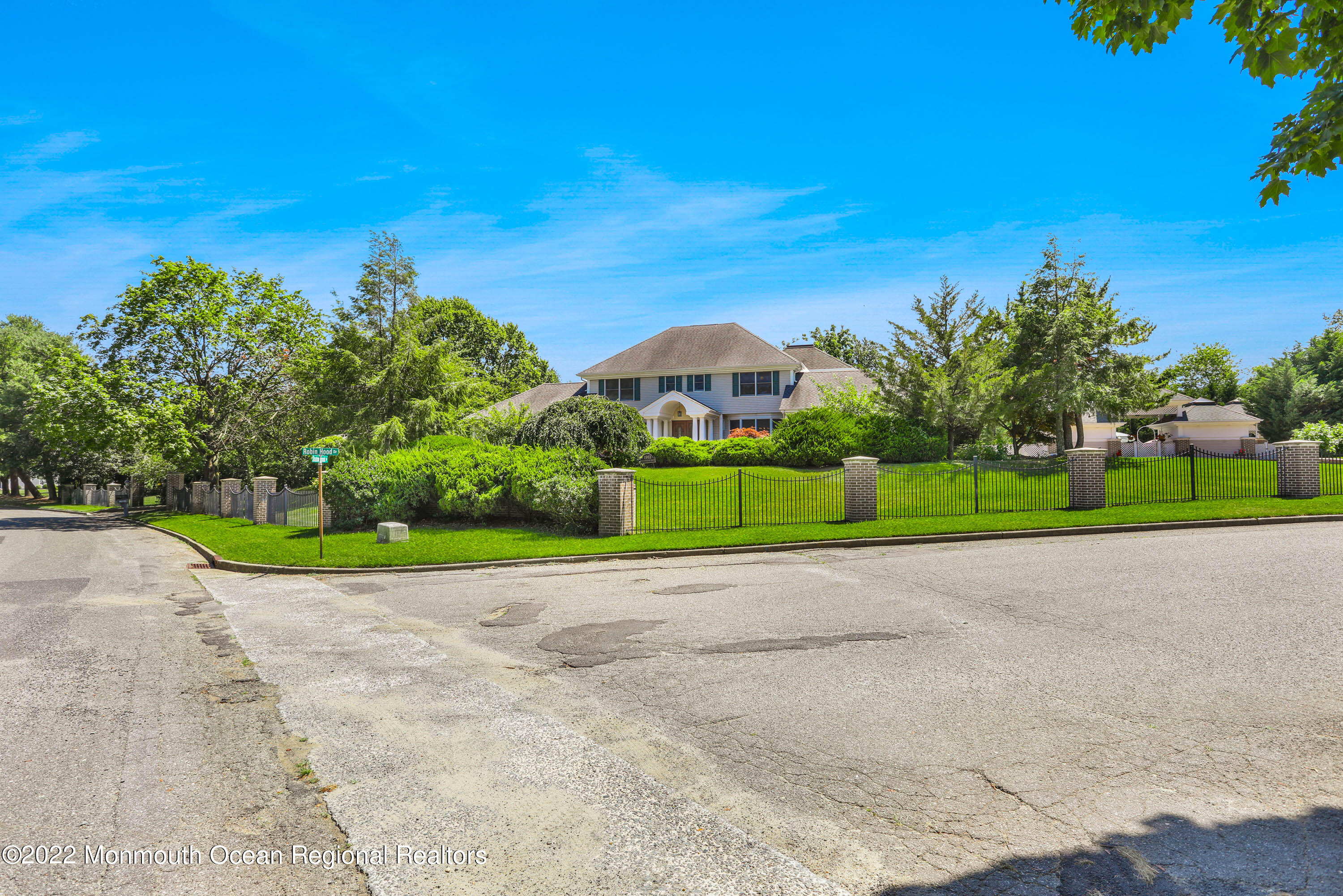 1903 Shadowbrook Drive Wall, NJ 07719 - Photo 73 of 74 a view of a road with a building in the background