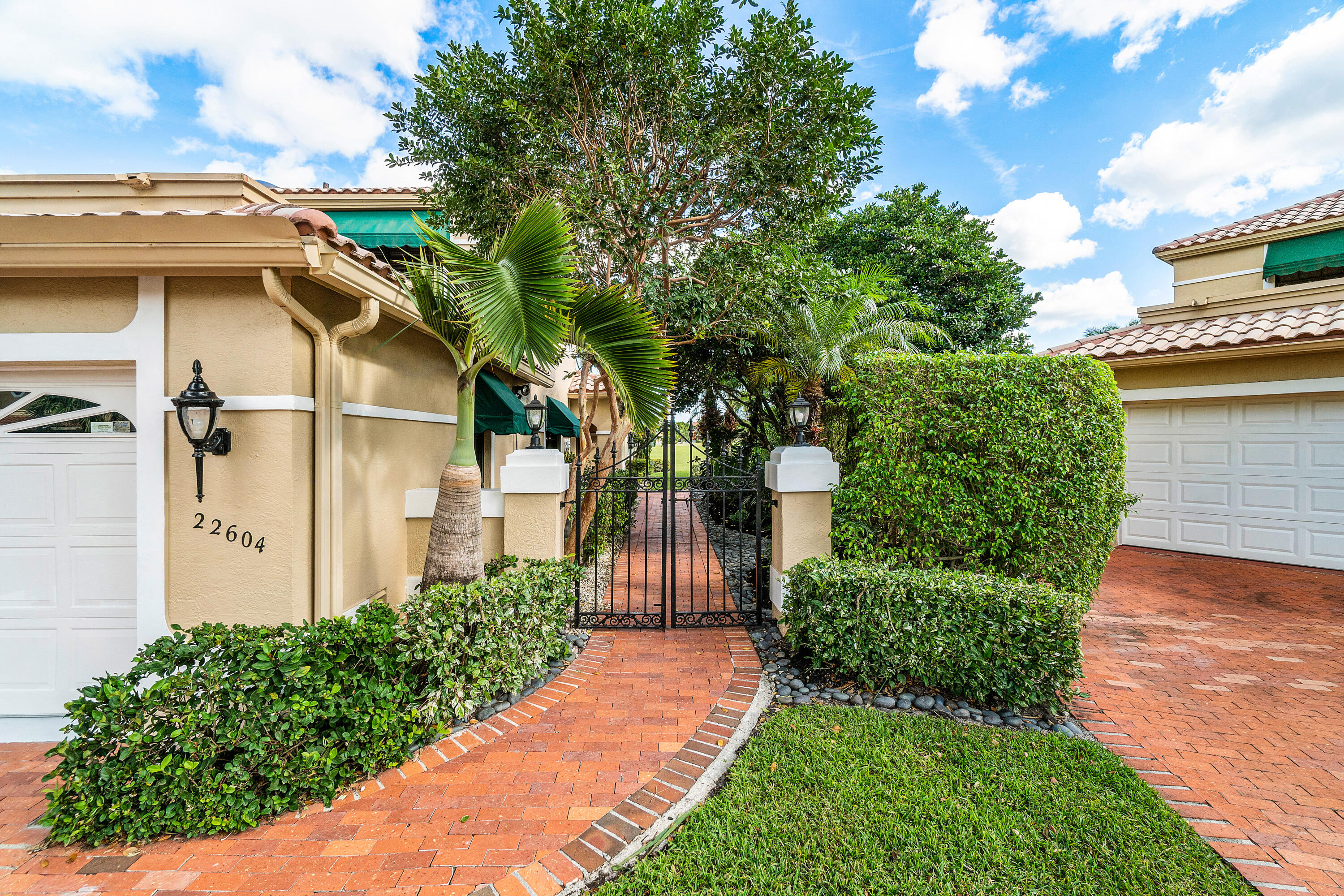 22604 Caravelle Circle Boca Raton, FL 33433 - Photo 3 of 43 SIDE ENTRANCE