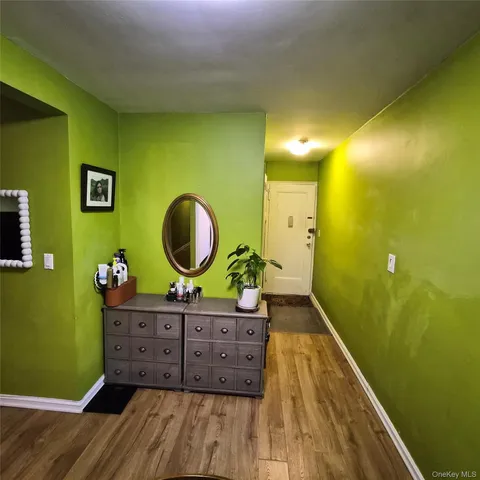 a bedroom with a bed and dresser