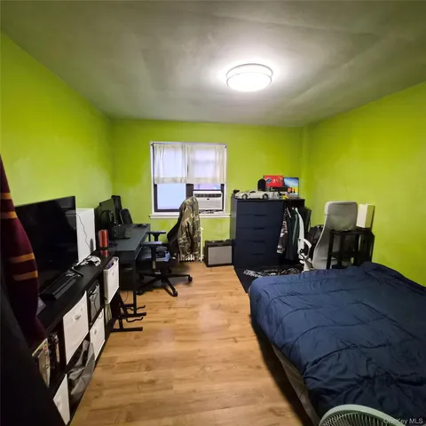 a room with toys and a wooden floor