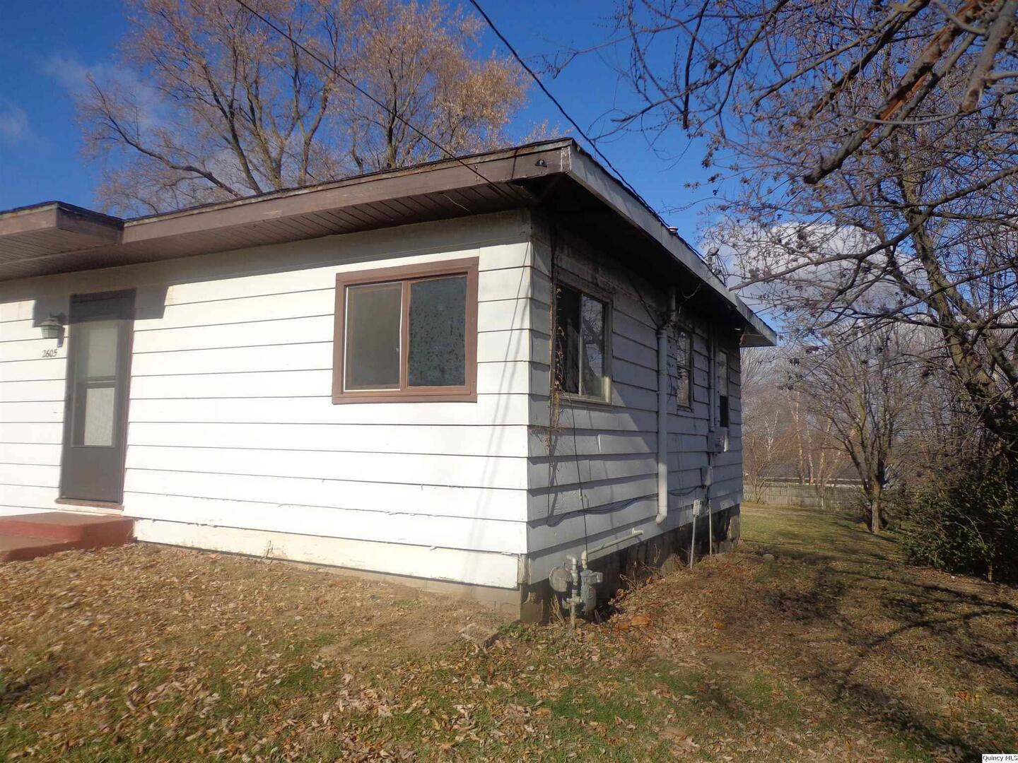 2605 Larch Road Quincy, IL 62301 - Photo 2 of 3 a view of a house with a yard