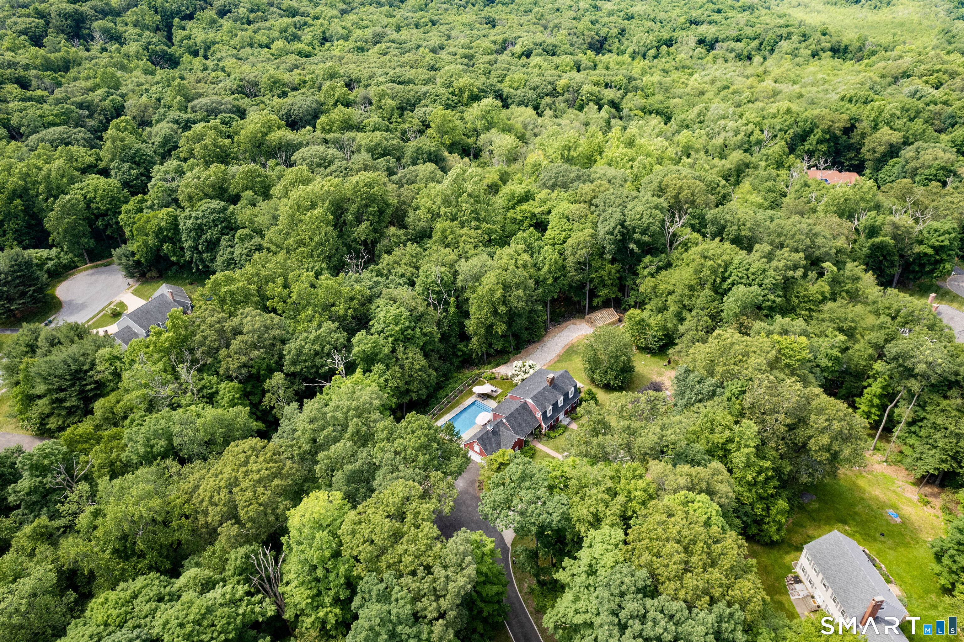 776 Bethany Mountain Road Cheshire, CT 06410 - Photo 36 of 40 an aerial view of a house with a yard
