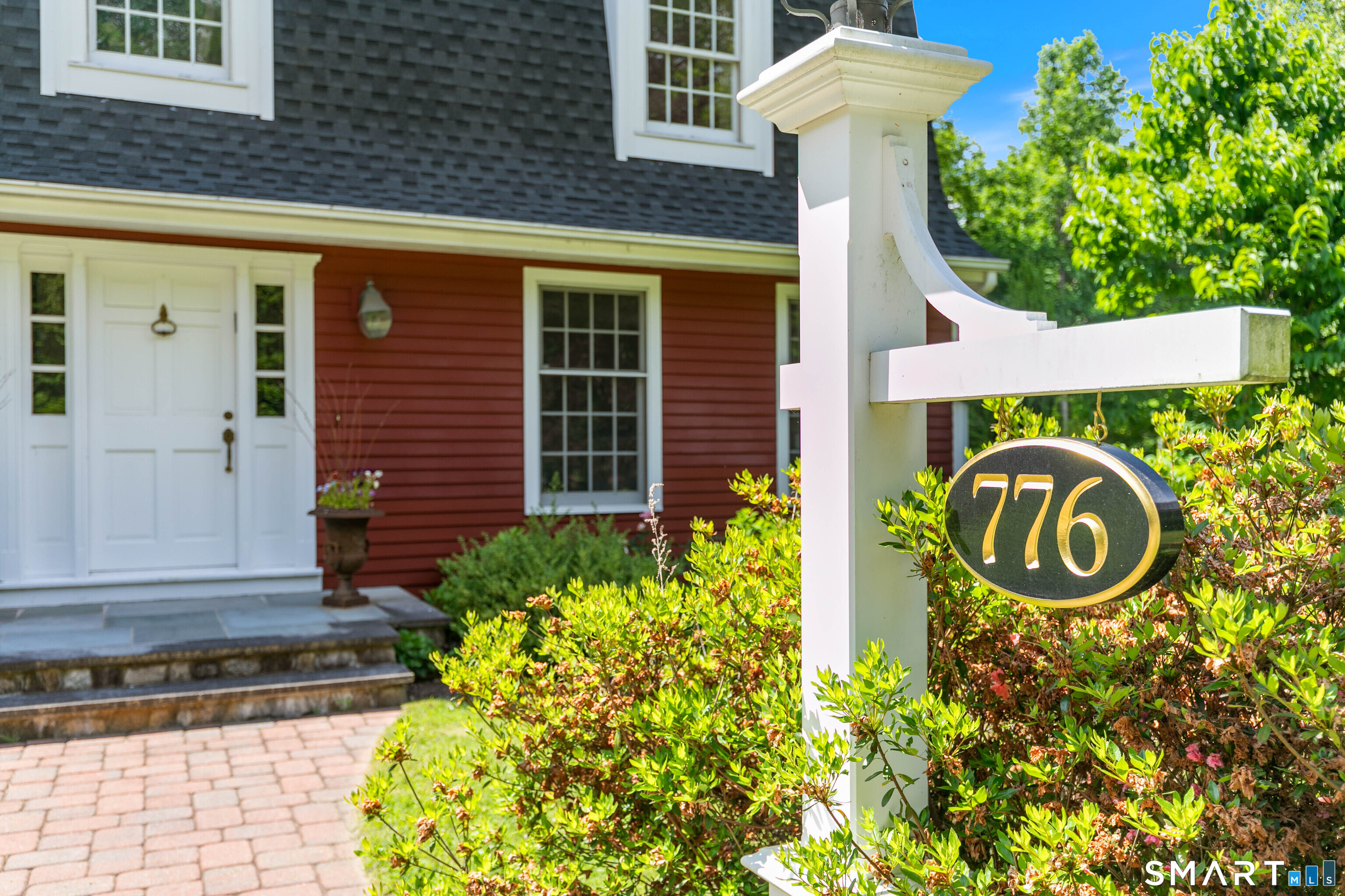 776 Bethany Mountain Road Cheshire, CT 06410 - Photo 4 of 40 a front view of a house having yard