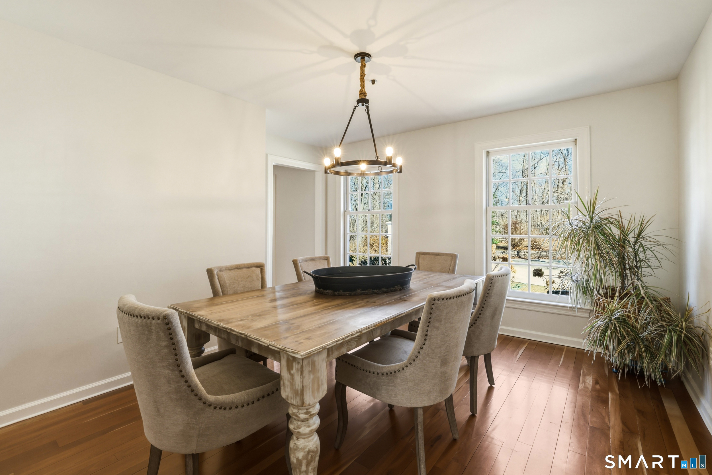 776 Bethany Mountain Road Cheshire, CT 06410 - Photo 6 of 40 a view of a dining room with furniture window and wooden floor