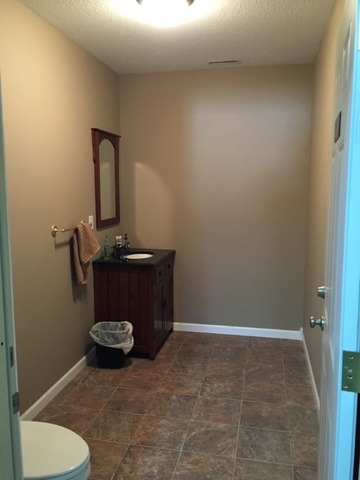 18102 Lincoln Road Morrison, IL 61270 - Photo 18 of 25 a bathroom with a sink and toilet