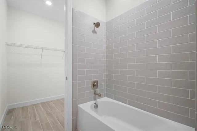 a bathroom with a bathtub