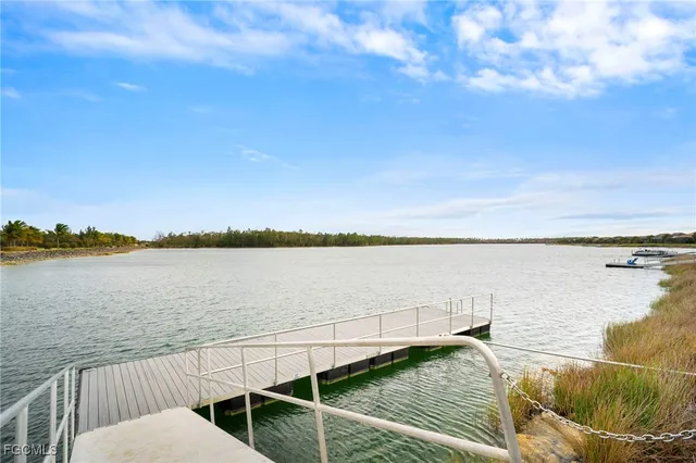a view of a swimming pool with a lake view