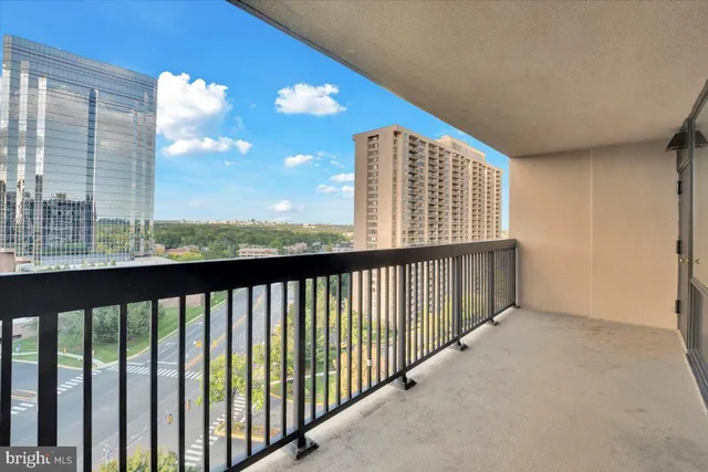 a view of balcony with furniture